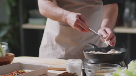 chef preparing a stir-fry dish