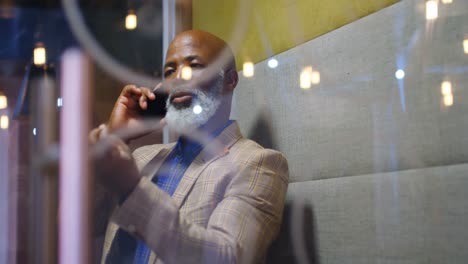 Senior-businessman-talking-on-the-phone-4K-4k