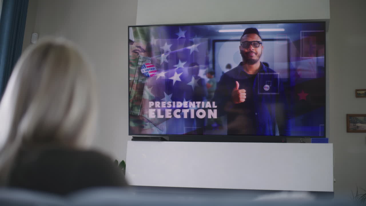 대통령 선거 보도를 지켜보는 여성