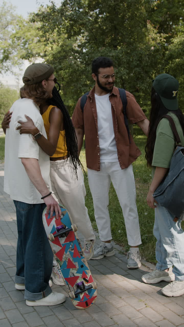 Friends Socializing and Meeting in a Park
