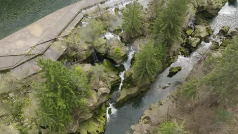 A-downward-looking-slow-cinematic-shot-of-Traunfall-Austria-in-summer