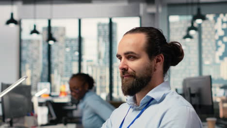 trader in office closing eyes to do daydreaming, visualizing financial success