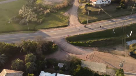 motorcycle riding along punta del este main road in uruguay