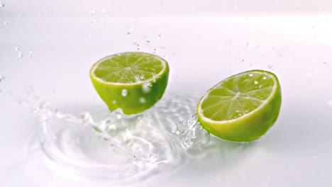 lemon slices falling into water