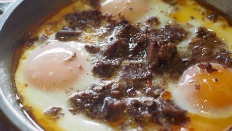 fried eggs with beef