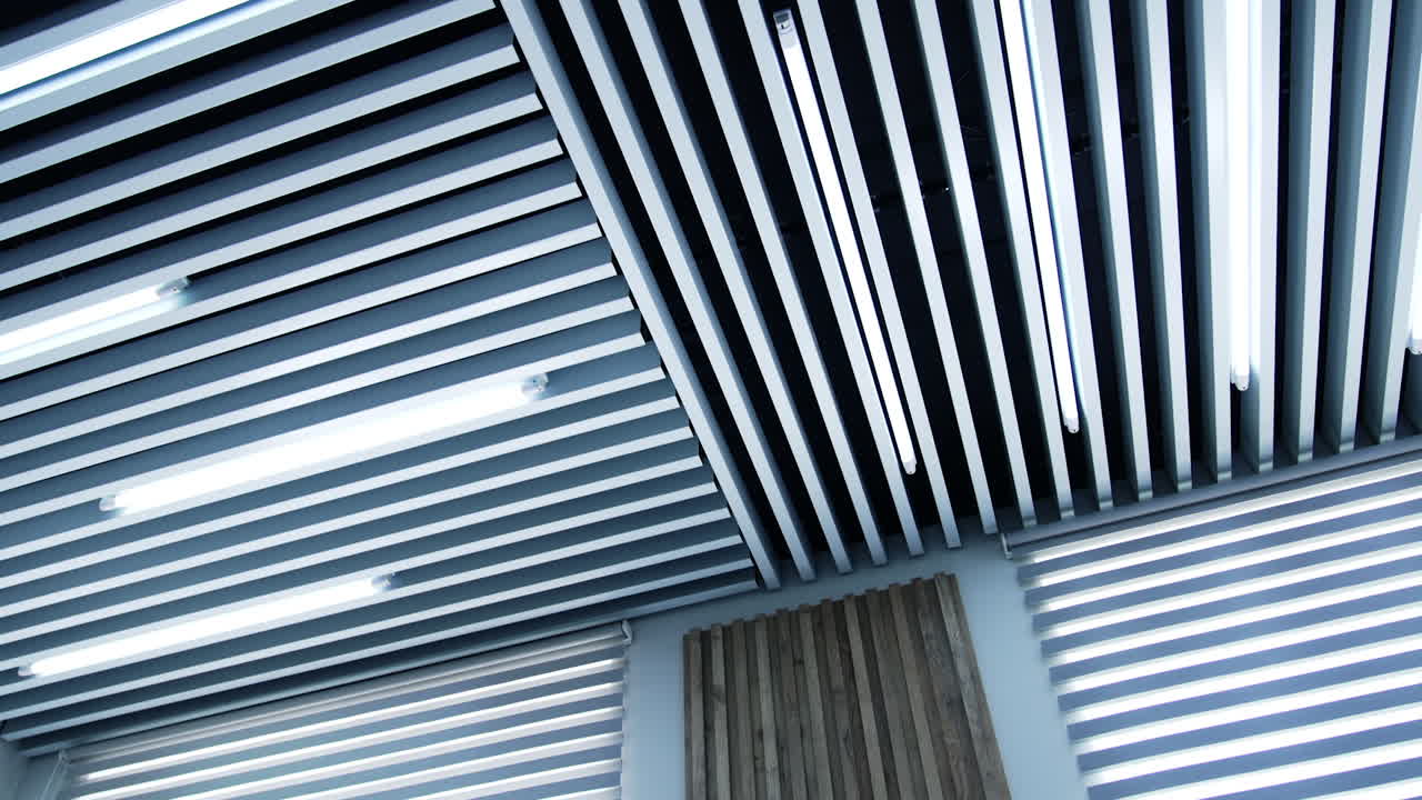 Geometric details in the design of the room. Long ledges with lamps of daylight among them.