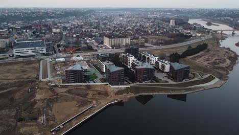 beautiful modern new apartment buildings on riverside in kaunas city, aerial view