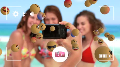 iconos de emoji con amigos tomando una selfie en el fondo