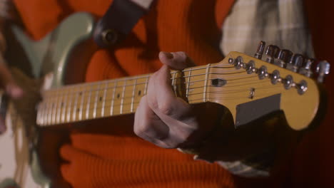 Close-Up-Of-An-Unrecognizable-Male-Musician-Playing-Guitar