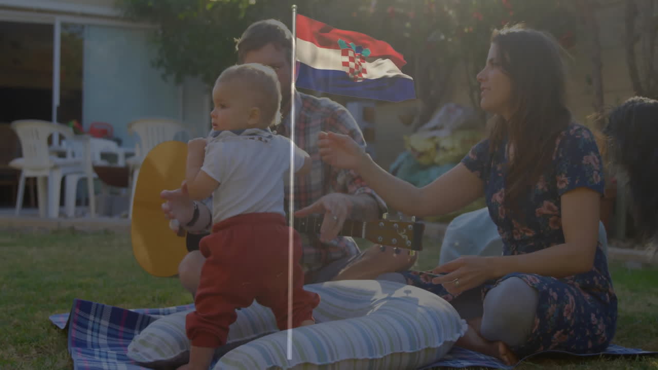 Picnic with family, Croatian flag waving, enjoying animation in park setting