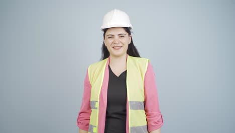 The-engineer-wearing-a-hard-hat-and-smiling.