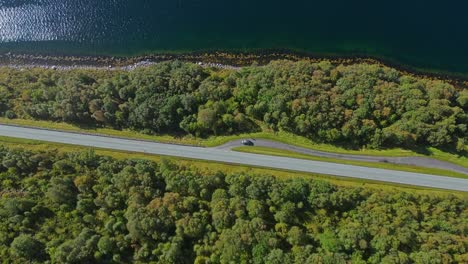 Aerial-over-road-near-Syvdefjorden-in-the-Vanylven-Municipality,-Norway