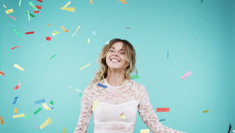 Beautiful-woman-dancing-in-multicolored-confetti-slow-motion-party-photo-booth