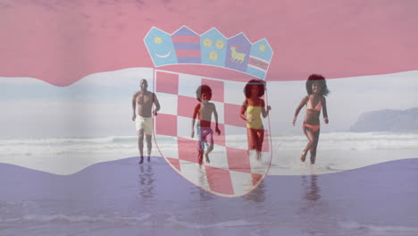 Running-on-beach,-family-with-Croatian-flag-animation-in-background