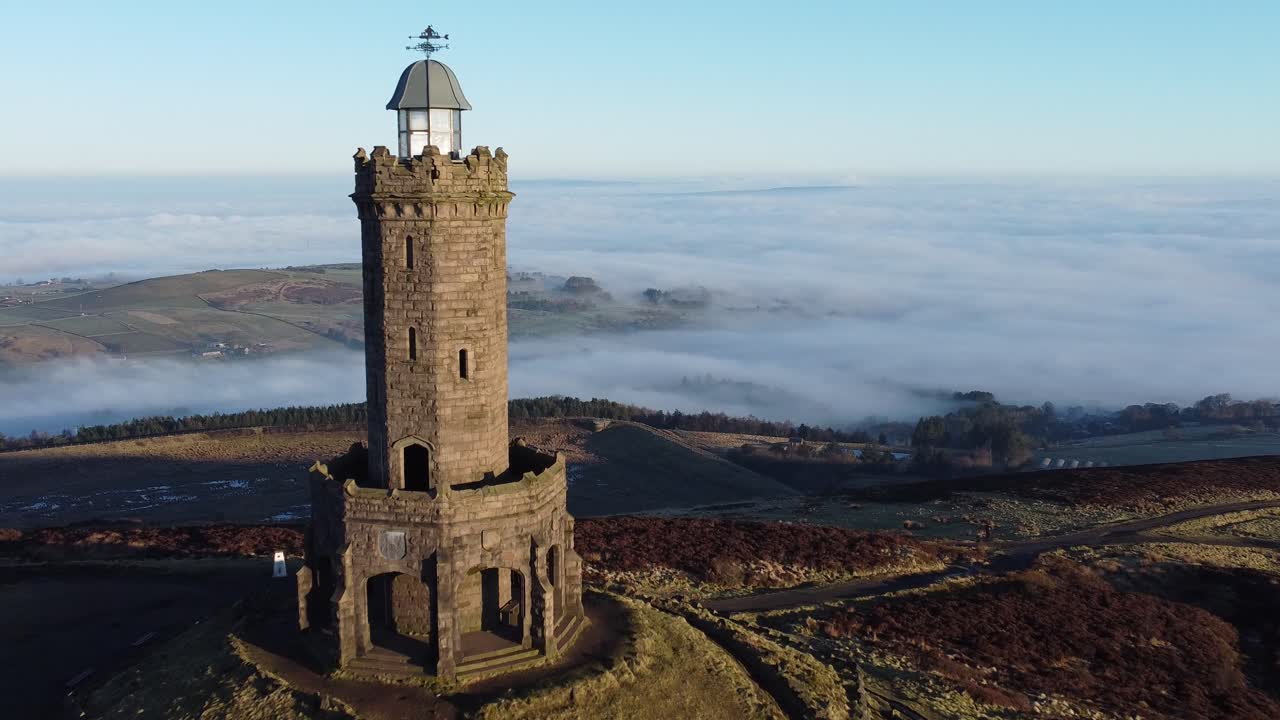Darwen Jubilee tower sunrise Lancashire hillside misty valley moorland countryside aerial fly past