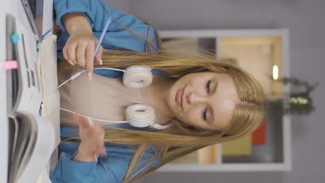 Vertical-video-of-Crazy-Female-student.