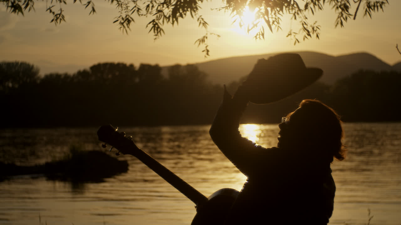 Sunset Musician by the River
