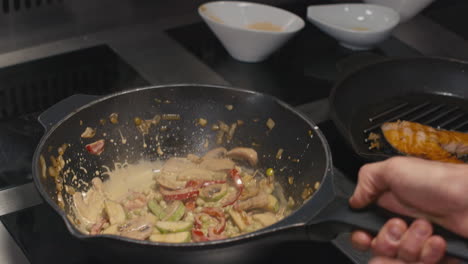 boiling cream sauce at restaurant kitchen
