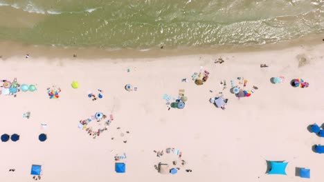 Gulf-Shores,-Alabama-beach-with-drone-video-moving-overhead