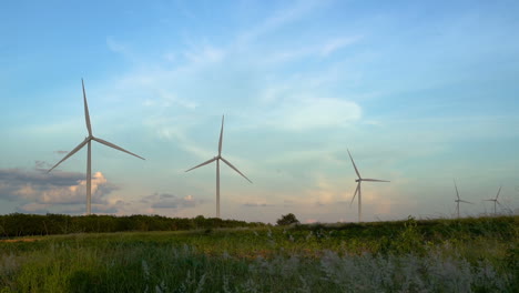 wind turbine farm. wind turbines under blue sky