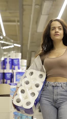 woman shopping for toilet paper