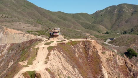 aerial: drone, devil's slide bunker, flying away view