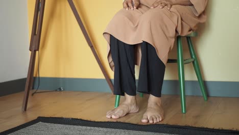 woman sitting on a chair