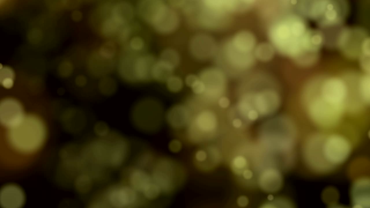 círculos verdes borrosos cayendo hacia abajo.