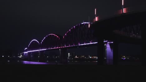 the big four pedestrian bridge in louisville kentucky at night with the walking ramp in the foreground 4k