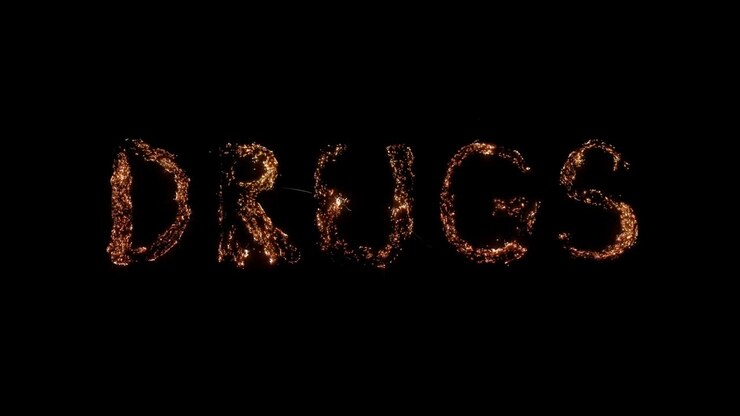 Word DRUGS burning. Ambers smoldering on transparent background. Beautiful!