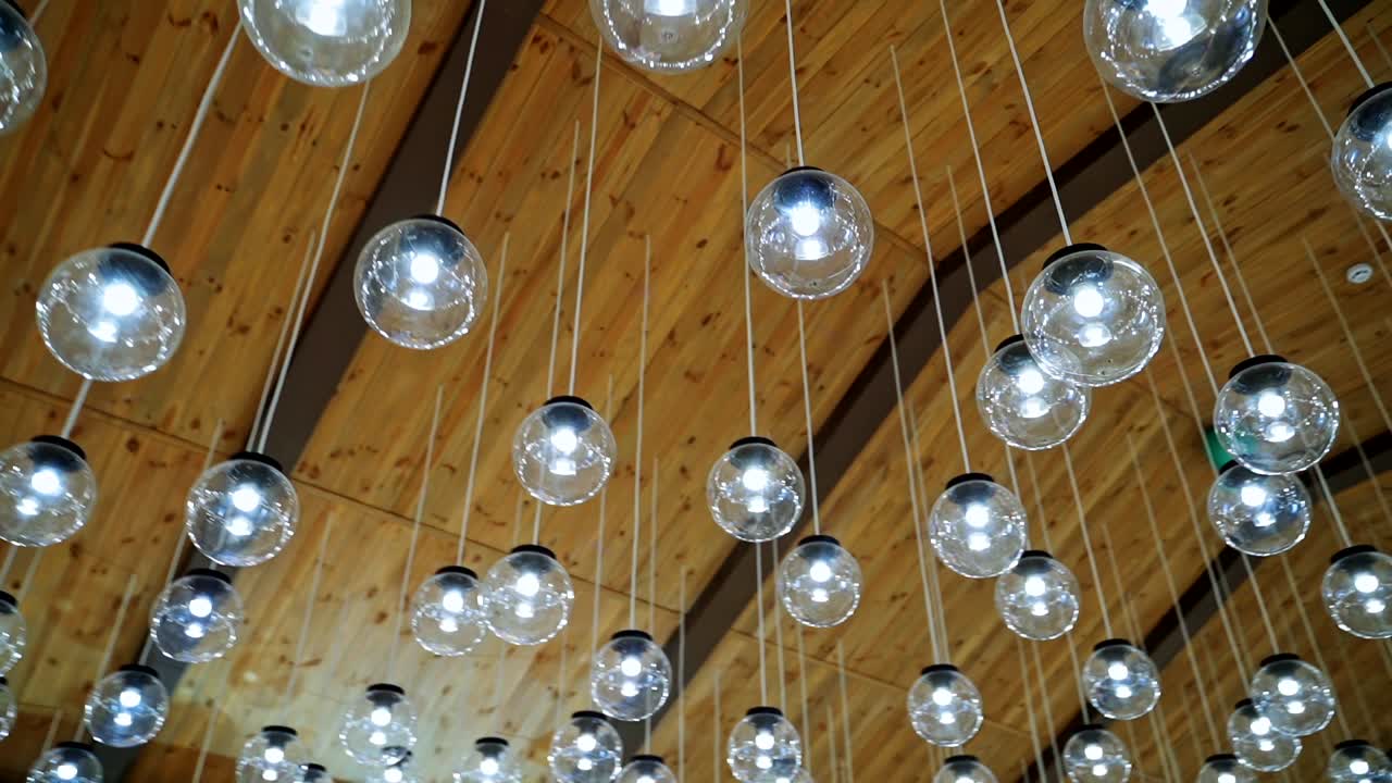 Luxury beautiful light lamp. Set of glowing lamp hanging on the wire