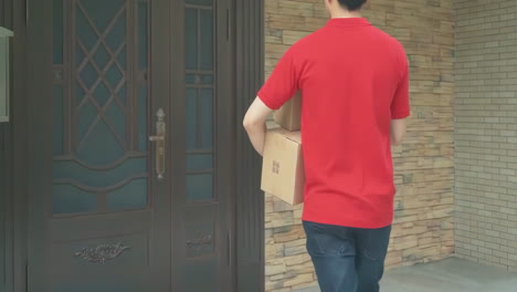 delivery man uniform smiles during express, courier holding a small package parcel delivering goods to customer's home with van truck, door-to-door services