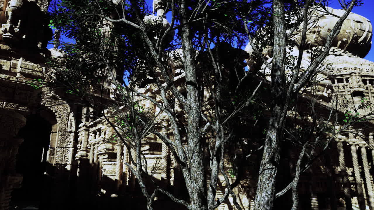Majestic ancient architecture surrounded by lush greenery under clear sky