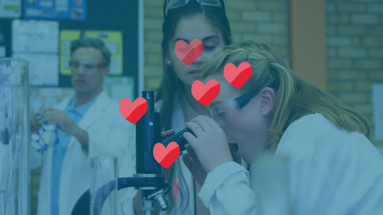 animación de corazones que caen sobre un grupo diverso de estudiantes en el laboratorio