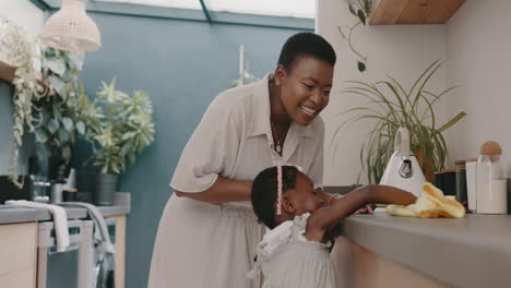 Black-woman,-mother-and-child-learning-cleaning