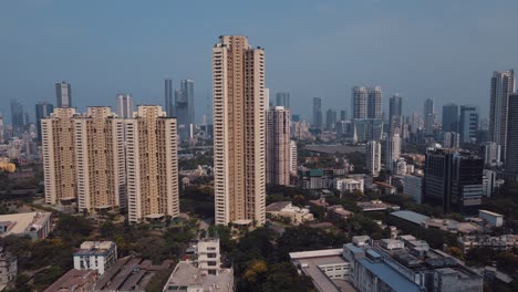 modern city high rise skyscraper buildings of new india. aerial drone view of the financial district of mumbai.