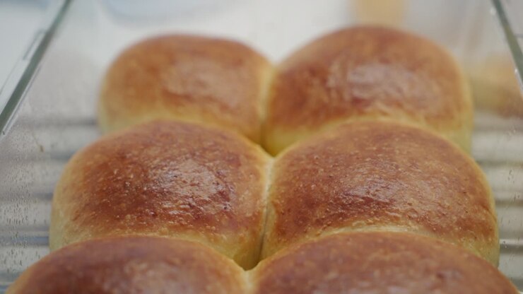 Homemade round-shaped soft buns dinner rolls baked in an oven