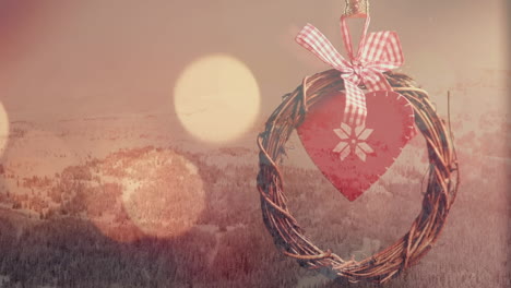animation of glowing spots and christmas decoration with and winter landscape