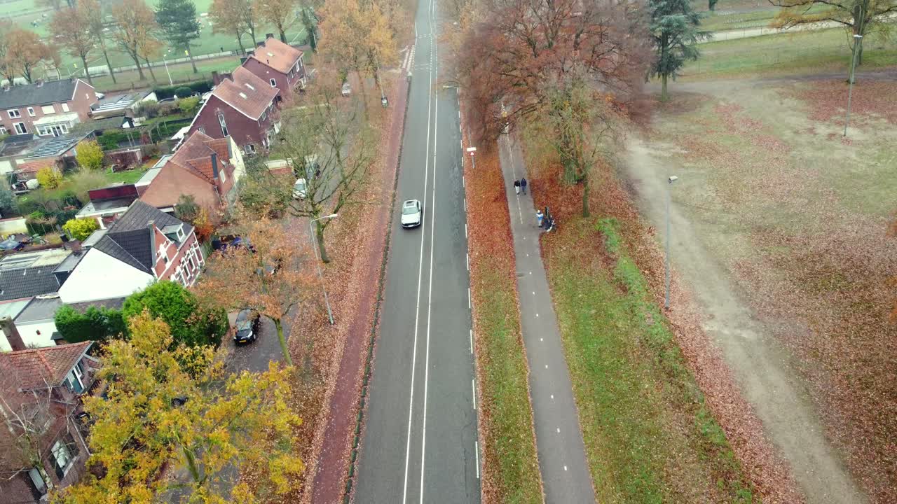 Aerial view of a road in autumn