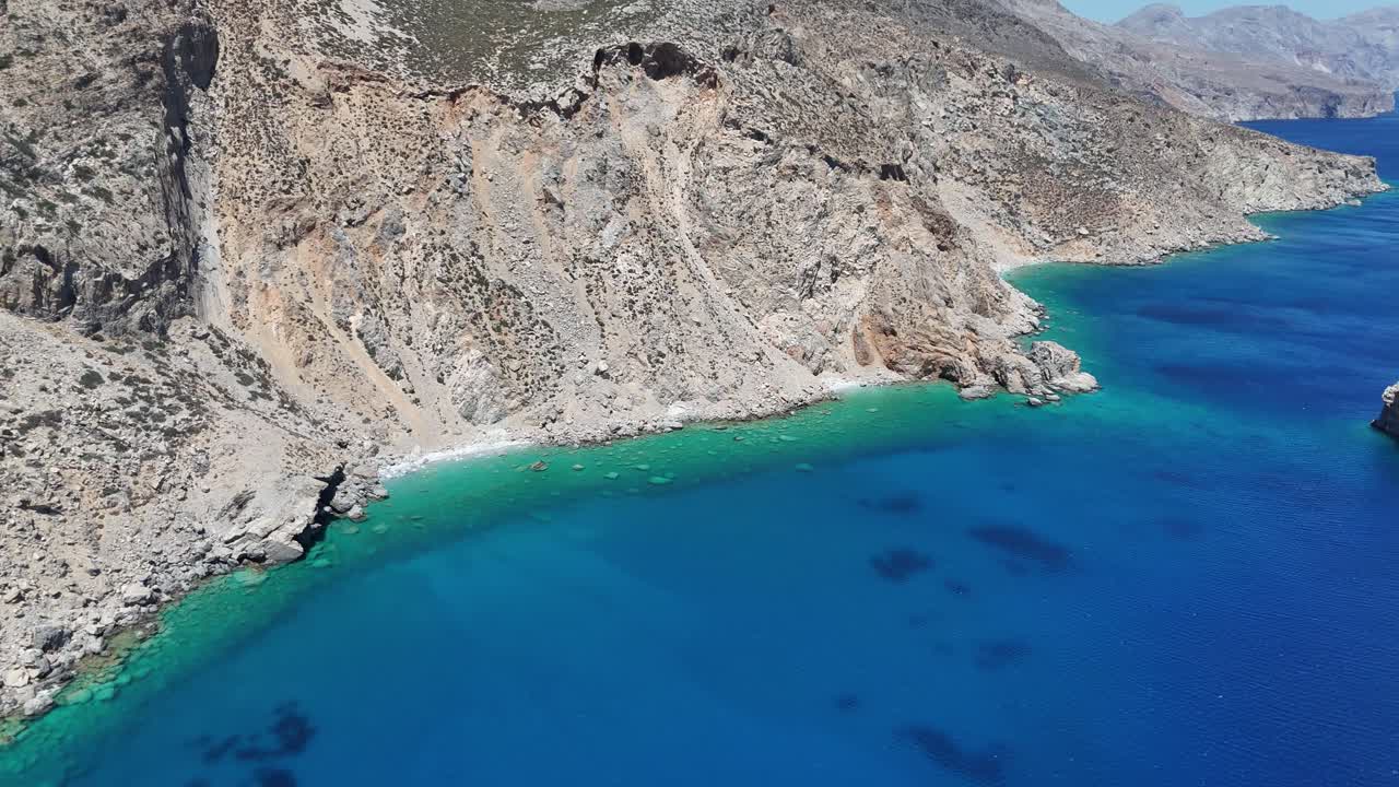 Amorgos east side with stunning deep blue and turquoise waters | 4K aerial shot