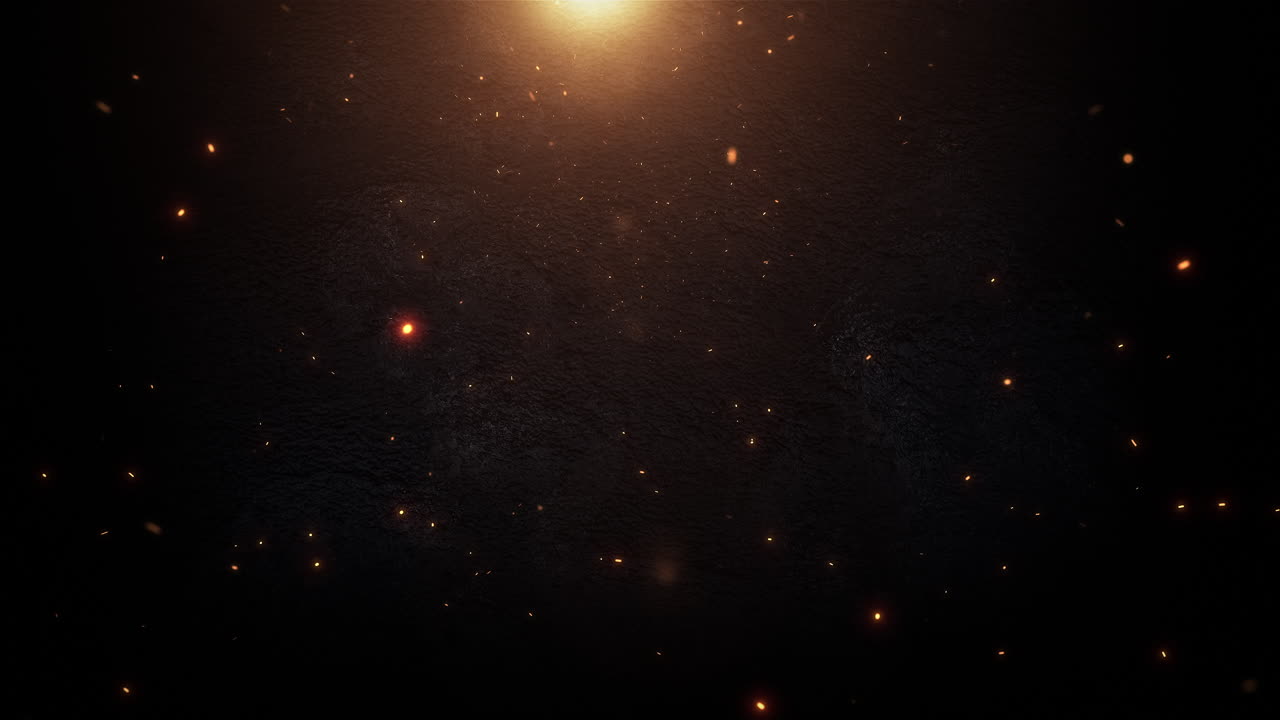 Warm Light and Floating Sparks on a Dark Textured Surface