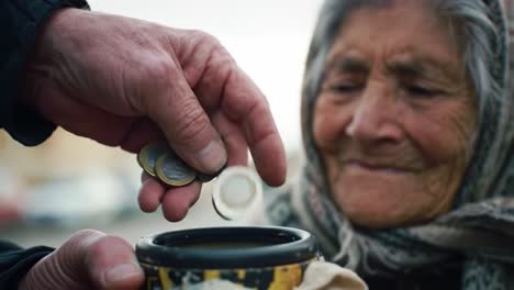 an elderly woman with a warm smile receives coins from a kind passerby. this moment takes place on a bustling street, highlighting human connection and compassion in everyday life.