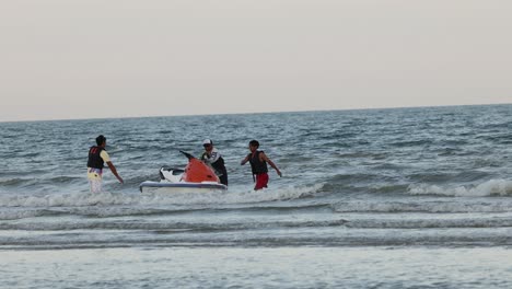 people enjoying a jet ski ride on ocean waves