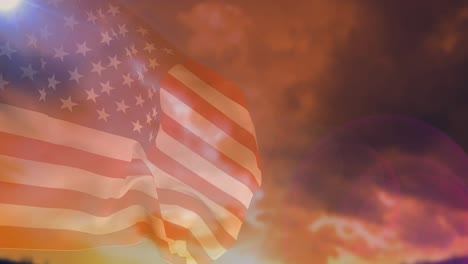 Animation-of-american-flag-over-stunning-sky-landscape