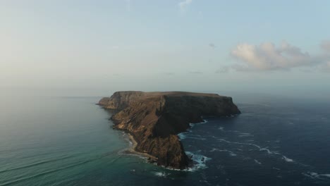 Early-morning-sunlight-on-beautiful-uninhabited-island-in-Atlantic-Ocean,-aerial