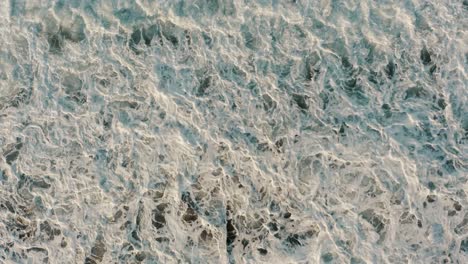 Birds-Eye-View-Of-Frothy-Waves-Splashing-On-Monterrico-Seacoast-In-Guatemala