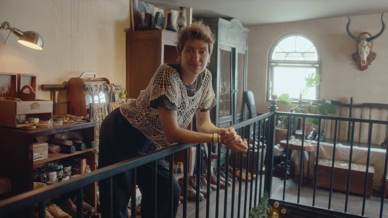 Young Female Collector Posing in Vintage Store of Rare Items