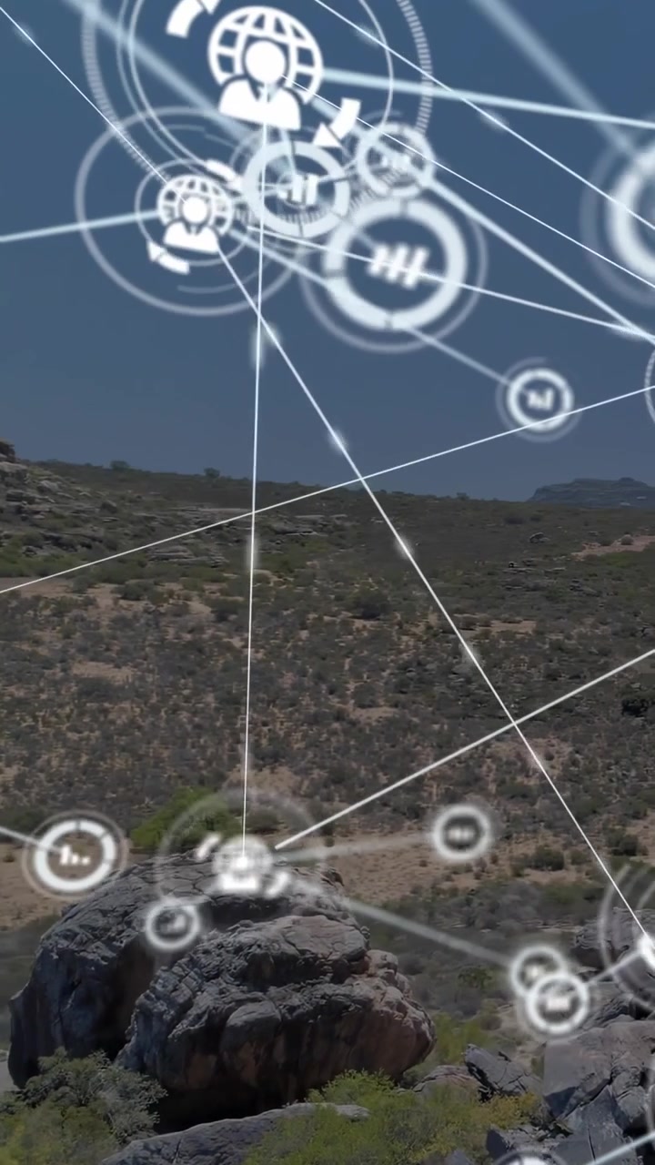 Video verticale: Affioramento roccioso a destra, linea che entra dall'alto a sinistra avviando una sovrapposizione HUD per la mappatura tecnologica