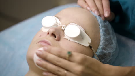 Woman-being-prepped-in-a-skincare-clinic