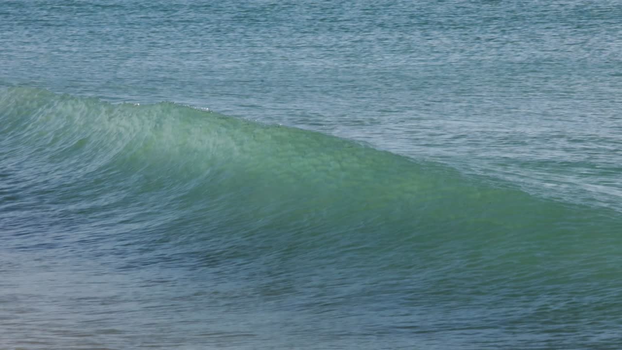 Aqua green blue waves twisting at the crest, Bay of Bengal Sea